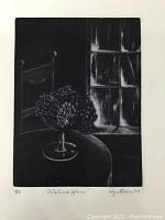 Close-up of the etching showing a still life with grapes on a table by a window, signed and numbered 9/12, dated 1974.