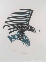 Full view of silkscreen print “Eagle and Salmon” laid flat