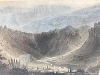 Close-up showing the detailed mountain landscape and village within the engraving.