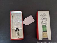 Mikasa Cherub Song crystal wine bottle stopper in original red and cream box with product illustration