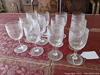 All twelve glasses arranged on dining table