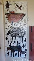 Full front view showing ark, sheep, silhouettes and animal figures