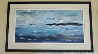 Full frontal view of the framed painting showing seascape scene and frame details.