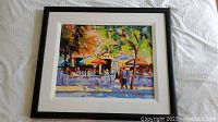Overall view of framed acrylic painting showing front of artwork