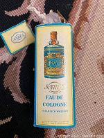 Photo of the original cardboard box for No. 4711 Eau de Cologne showing front design and branding.