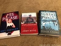 Three biography and autobiography books from front cover, showing titles and authors