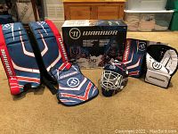 Full set of street hockey goalie equipment including pads, mask, blocker, catch glove, chest protector and original box