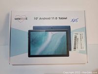 Box of a blue 10-inch weelikeit Android 11.0 tablet showing front and rear of device on packaging.