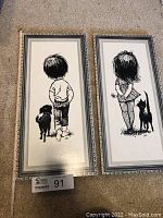 Two framed black-and-white drawings side by side, showing a little boy and girl with their respective pets and signature of Bernard + Patricia.