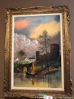 Full-frontal view of the signed J. Greco oil painting depicting castle, water and mountains