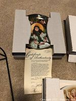 Scarlett and her Suitors W.S. George plate with certificate of authenticity in protective cardboard holder.