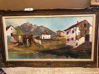 Frontal view of the oil painting in its carved gilt wood frame