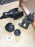 Photo showing entire lot with carved Thunderbird, human figure, and two trinket boxes