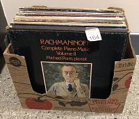 Front view of box with Rachmaninoff Complete Piano Music Volume II album visible on top.