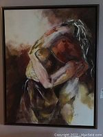 Full view of the framed giclee print displaying two embracing figures in subdued browns and creams.