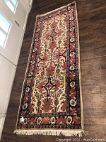 Full length view showing overall design and fringe