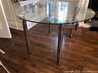 Round glass table top with chrome legs