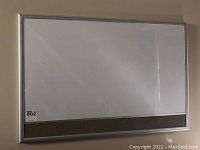 Front view of whiteboard with cork board strip along the bottom, shows lot sticker on lower left corner