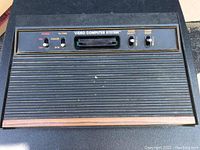 Top view of Atari 2600 console showing control panel with power, TV type, game select, and game reset switches.