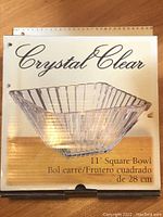 Packaging front of Crystal Clear 11 inch square crystal bowl showing bowl image and measurement.