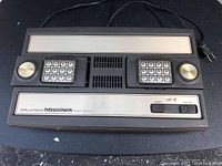 Top view showing numeric keypad controllers and control buttons on Mattel Intellivision I console.