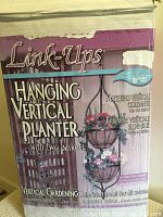 Box showing Link-Ups brand vertical hanging planter with two baskets illustration and product details.