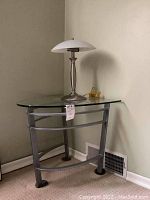 Glass side table with metal legs