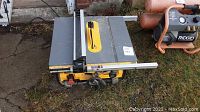 Top view of table saw on grass surface