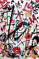 Close-up of front artwork showing red, black, gold, and blue spray paint designs on white canvas
