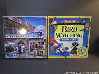 Both game boxes shown side by side facing front, clearly displaying game titles and artwork, indicating their visual condition and completeness.