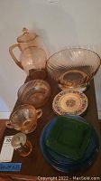 Full view of the glassware set including pitcher, bowls, plates, and sugar dish