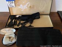 Tuxedo accessories including black bow tie, black cummerbund, black suspenders in original box, gold-tone cufflinks in velvet box
