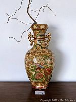 Full frontal view of the 19-inch Satsuma floor vase displaying detailed hand-painted bird and floral motifs with ornate handles.