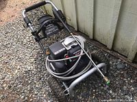 Full unit on gravel next to shed