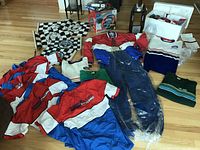 Wide overview of entire lot laid out on hardwood floor