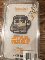 Photo shows Star Wars Foundmi Bluetooth Tracking Keychain in original packaging with Mandalorian character.