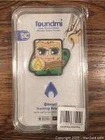 Foundmi branded boxed Bluetooth tracking keychain featuring a cartoon Aquaman DC Comics character with self remote button on keychain.