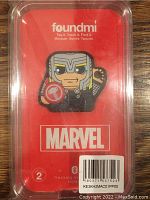Foundmi Marvel Thor keychain in original packaging with red background and Marvel branding.