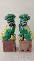 Front view of both foo dogs side by side