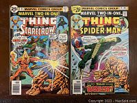 Photo of both Marvel Two-in-One comic books side by side showing full front covers, issue #17 with Spider-Man and Basilisk, issue #18 with The Thing and The Scarecrow