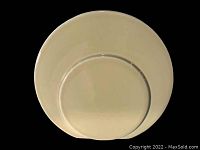 Bottom view of the Trenton Pottery Co midcentury vase showing the base design and condition.