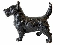 Side view of black painted cast metal Scottie dog doorstop showing texture and upright tail.