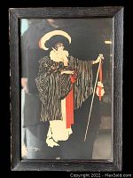 Front view of the framed Sarah Bernhardt illustration showing the full figure in striped coat and large hat, with cane and ribbon.