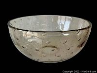 Front view of the clear blown glass bowl showing the bubble pattern and smooth rim.