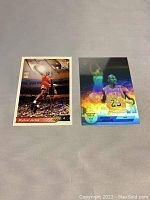 Both Michael Jordan basketball cards laid side by side on a flat surface showing front details.