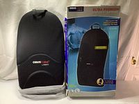 ObusForme Ultra Premium small backrest cushion displayed next to its original box showing front and side details.
