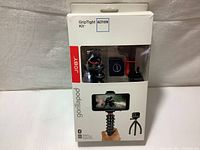 Photo of boxed Joby GorillaPod GripTight Action Kit showing external packaging with images and branding.
