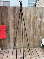 Full height view of the Primos Gen 2 Deluxe tripod trigger stick showing extended legs and V-Yoke on top.