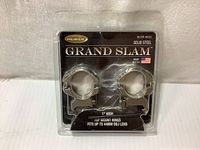 Front view of the new Weaver Grand Slam silver mount rings in original clamshell packaging showing product name, type, and fitment details.