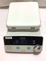 Front view of the Thermo Scientific Super-Nuova hot plate with control panel and ceramic heating surface visible.